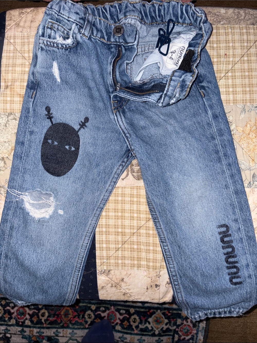 nununu Light Blue Relaxed Denim Jeans with Black Graphic